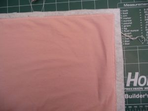 Large wrinkle in solid fabric due to poor pinning of Easy Phone Charger Holder