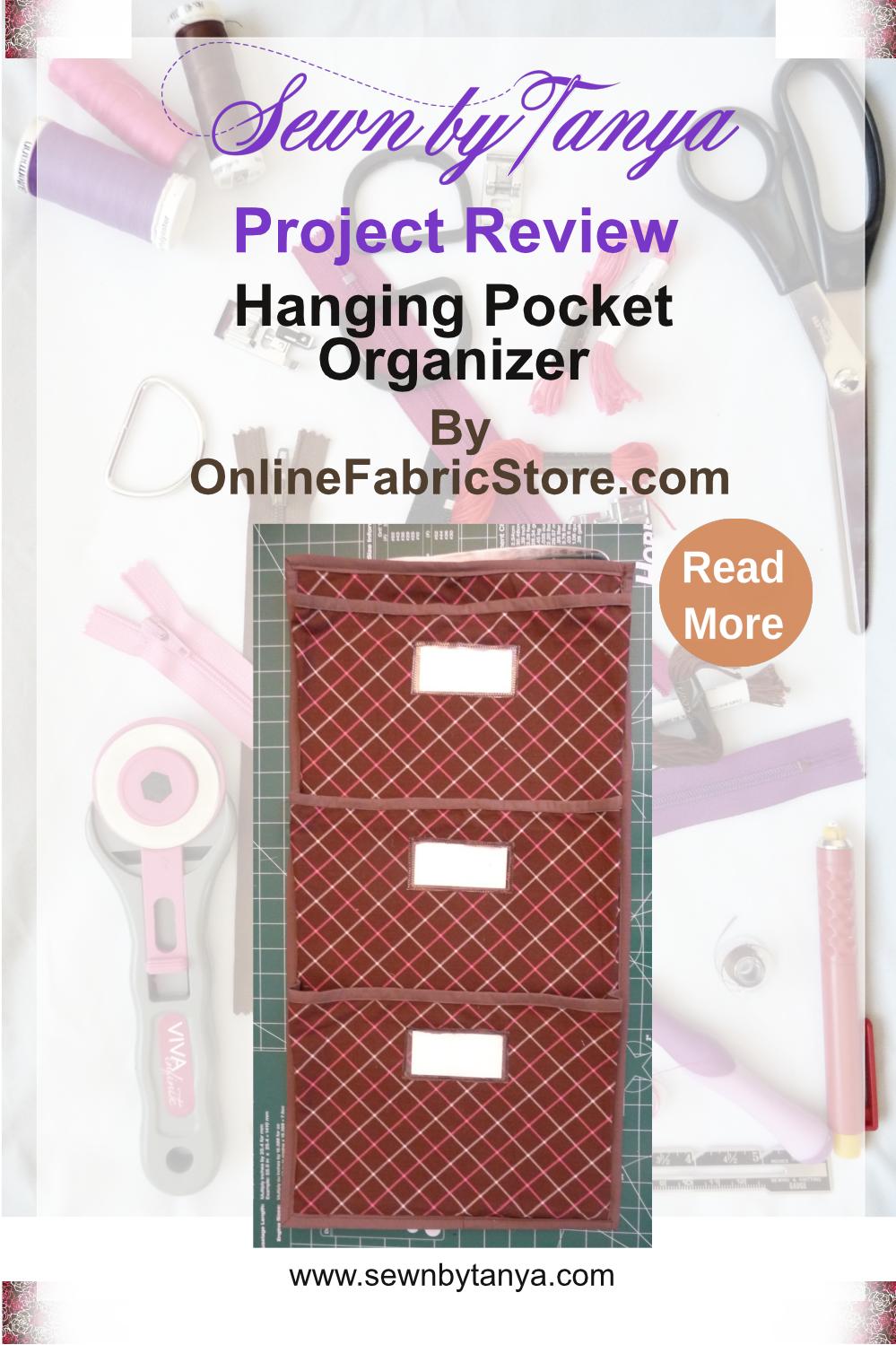 Pinterest image for "Sewn By Tanya Project Review | Hanging Pocket Organizer" showing brown Hanging Pocket Organizer on a green background