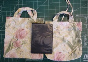 floral Fat Quarter Totes with black DVD case for scale